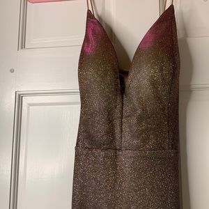 Windsor Rainbow Shimmery dress with nude lining underneath and a zipper back.